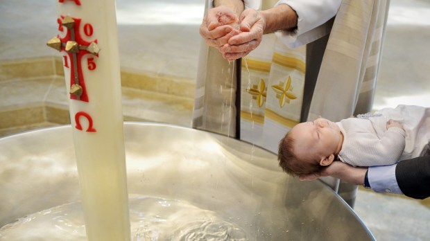 web-baptism-baby-girl-holy-water-c2a9corinne-simonciric-ai.jpg