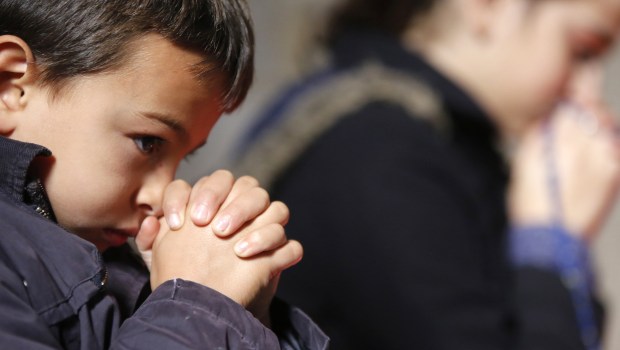 CHILD PRAYING