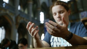 GIRL PRYING CHURCH