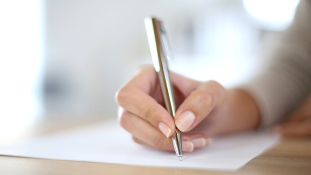 WOMAN,HAND,WRITING