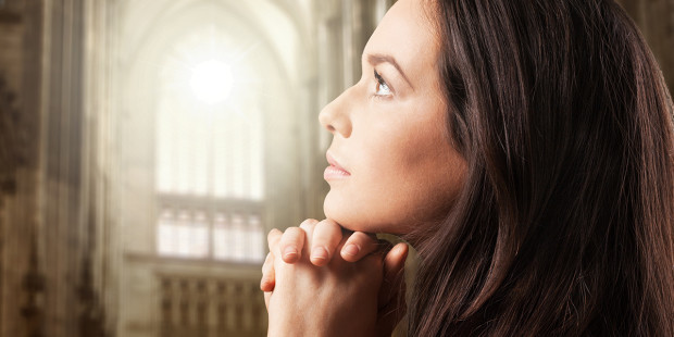 web3-woman-praying-cuhrch-light-shutterstock