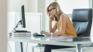 WOMAN,WORKING,DESK,OFFICE