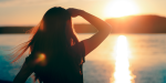 woman looking at the sunset