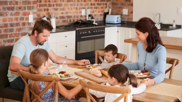 Family-Praying-Eating