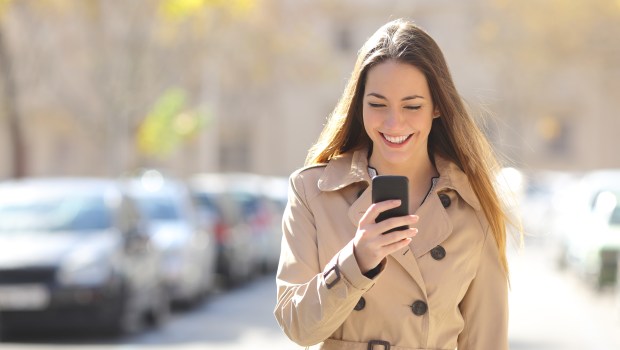 WEB2-WOMAN-STREET-PHONE-shutterstock_246869608.jpg