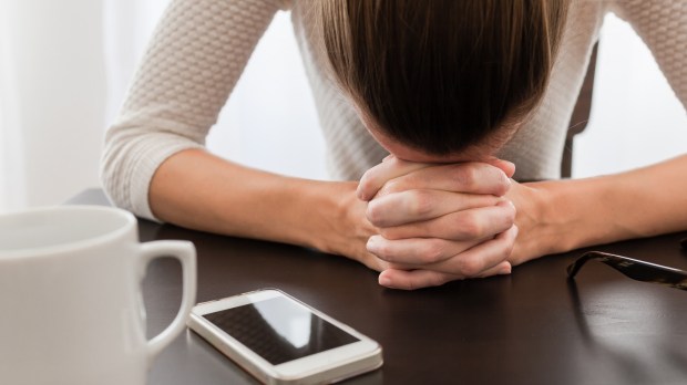 woman-pray-phone.jpg