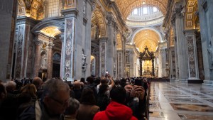 People wait in line to see the body of Pope Emeritus Benedict XVI