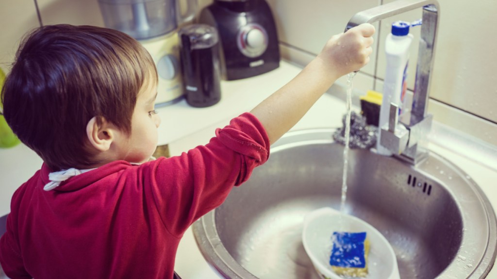 little boy housework