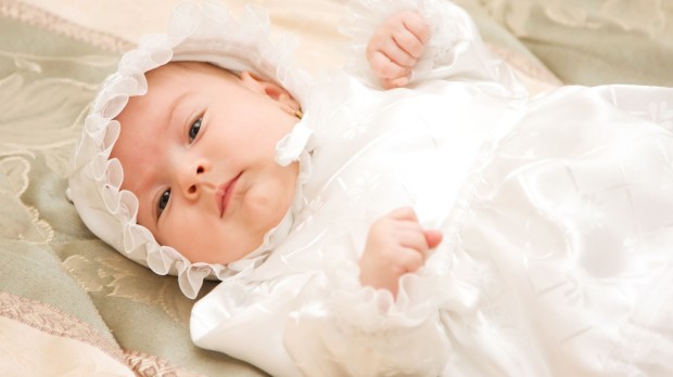 baptism baby dress Shutterstock