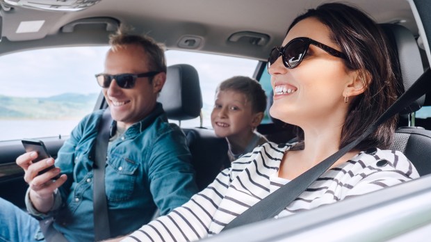 family riding in car