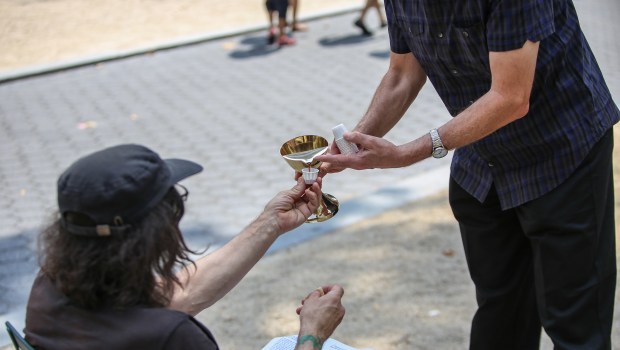 MASS-OUTDOOR-PRIEST-shutterstock_307733915.jpg