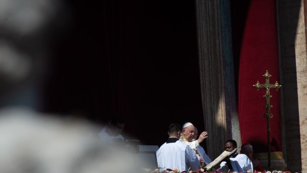 Pope Francis reads the Easter Urbi et Orbi message for Easter from the loggia of St. Peter's basilica