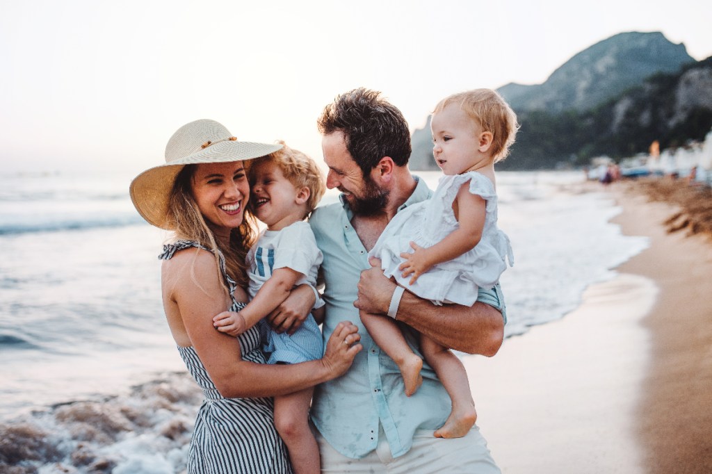 family-vacation-trip-beach-couple-kids