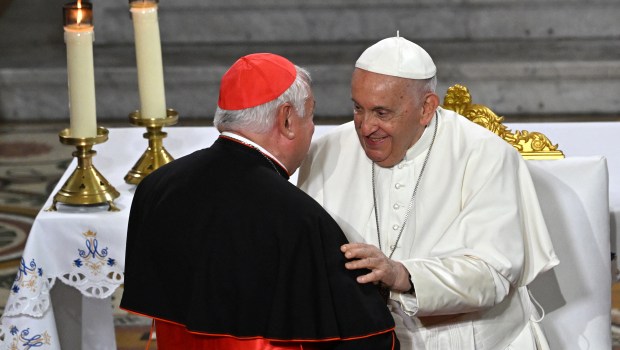 Pope Francis greets Marseille's Archbishop and Cardinal Jean-Marc Aveline