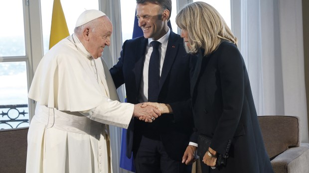 Pope Francis meets French President Emmanuel Macron and his wife Brigitte Macron at the Palais du Pharo, in the southern port city of Marseille