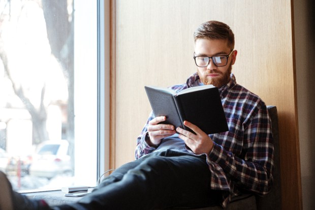 young-man-student-book-read-