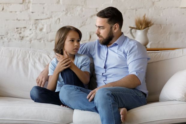 father talking with son