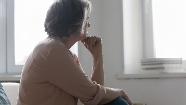 OLD-WOMAN-BACK-WINDOW-shutterstock